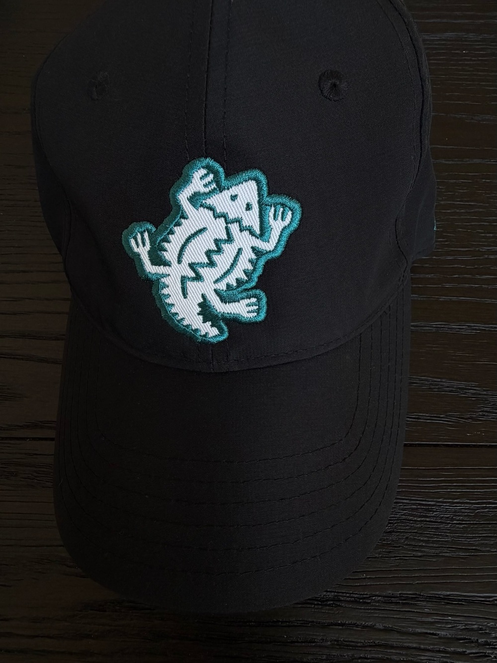 Toon North Under Armour Black Cap with Teal Crocodile Patch